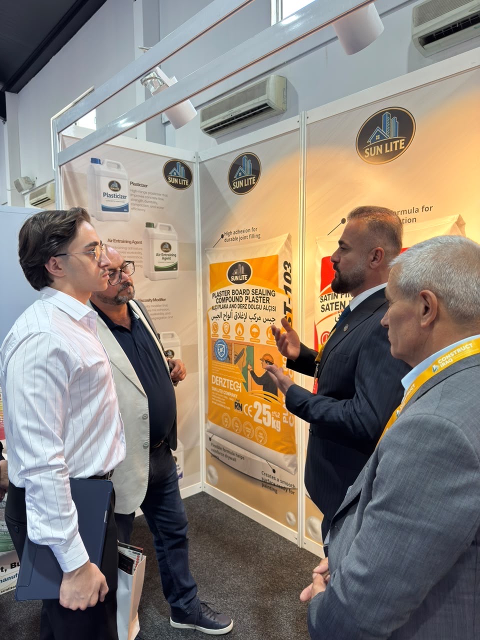 Sun Lite concrete admixtures and plaster products on display (ST-300 to ST-305 liquid admixtures)