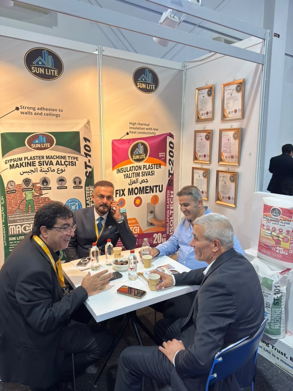 Business meeting at the Sun Lite stand